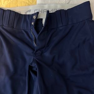 Navy blue softball pants.